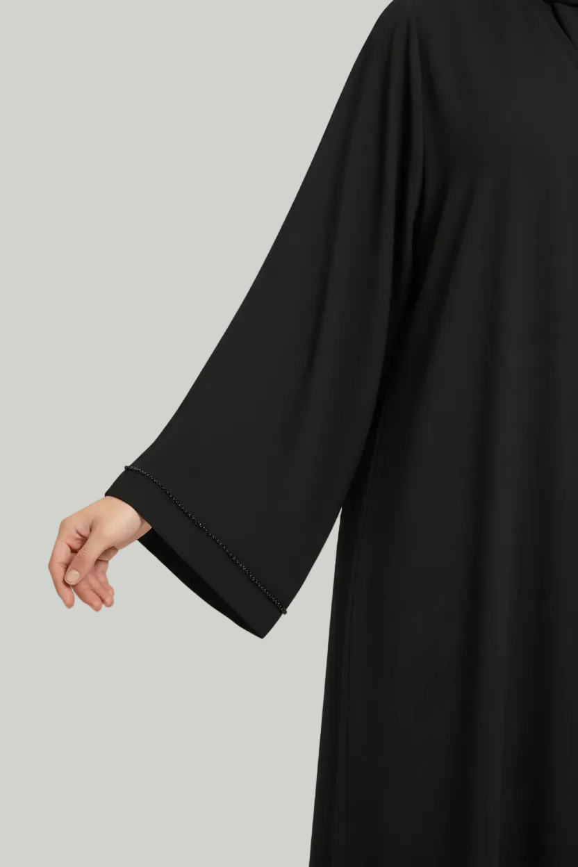 Abaya bordada en pedrería